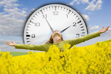 Woman in flower field with clock